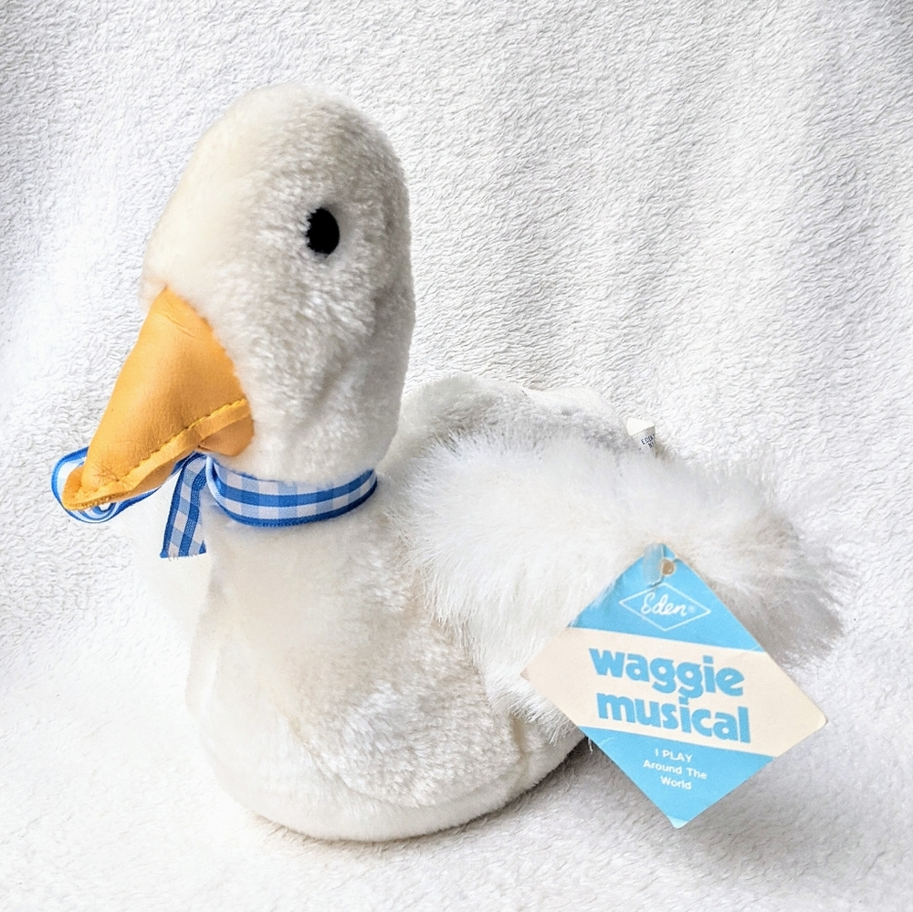 Vintage Eden Toys wind-up musical lullaby duck plush deadstock 1987